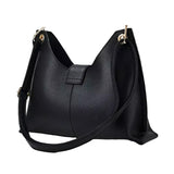 A black leather handbag with a curved shape and a gold-colored metal clasp on the top.