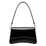 A black leather handbag with a curved handle and gold hardware.