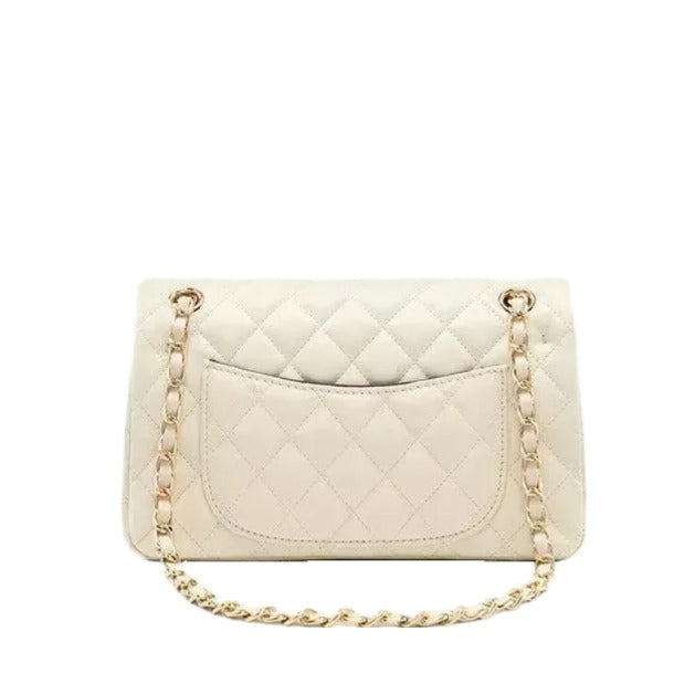 A white quilted leather handbag with a gold chain strap.