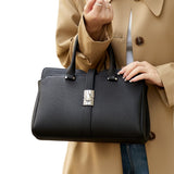 ELVORIA SIGNATURE LOCK CROSSBODY