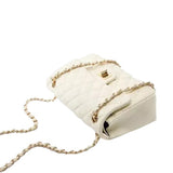 A white quilted handbag with a chain strap and a small gold clasp.