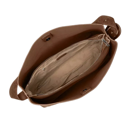 the interior of a brown leather handbag, with the zipper partially open and the interior visible.