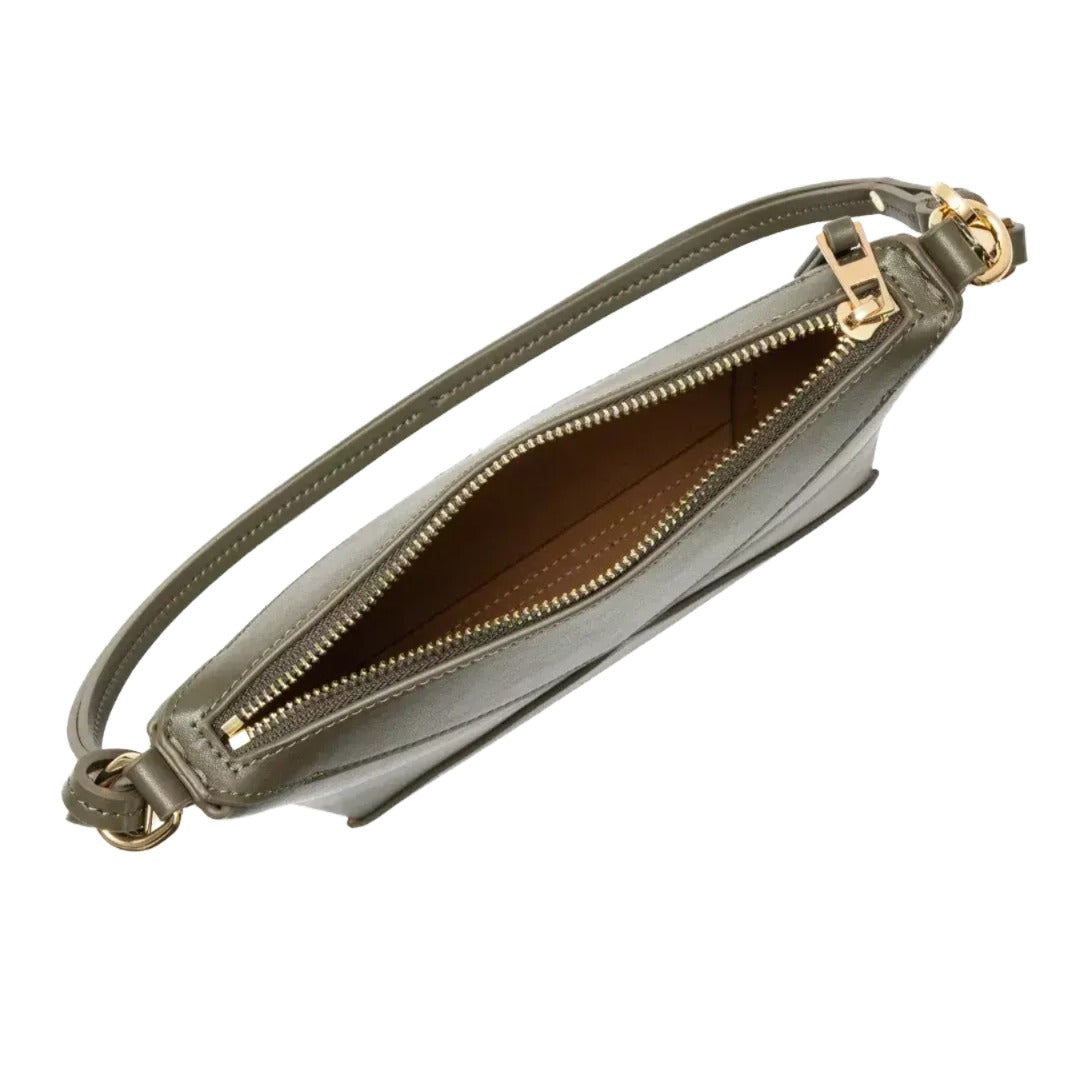 A small, leather handbag with a zipper closure and a gold-colored metal clasp.