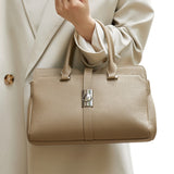 ELVORIA SIGNATURE LOCK CROSSBODY