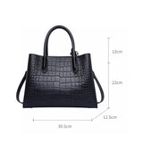 CAVIERA CROCO-EMBOSSED SHOULDER BAG