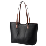 A black leather tote bag with brown leather straps and handles.