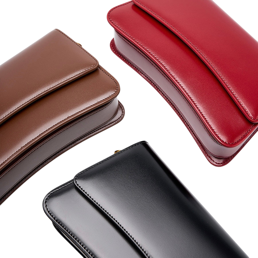 three different types of leather handbags or purses, each with a distinct color and design.