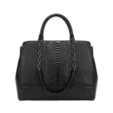 A black leather handbag with a textured pattern and metal chain straps.