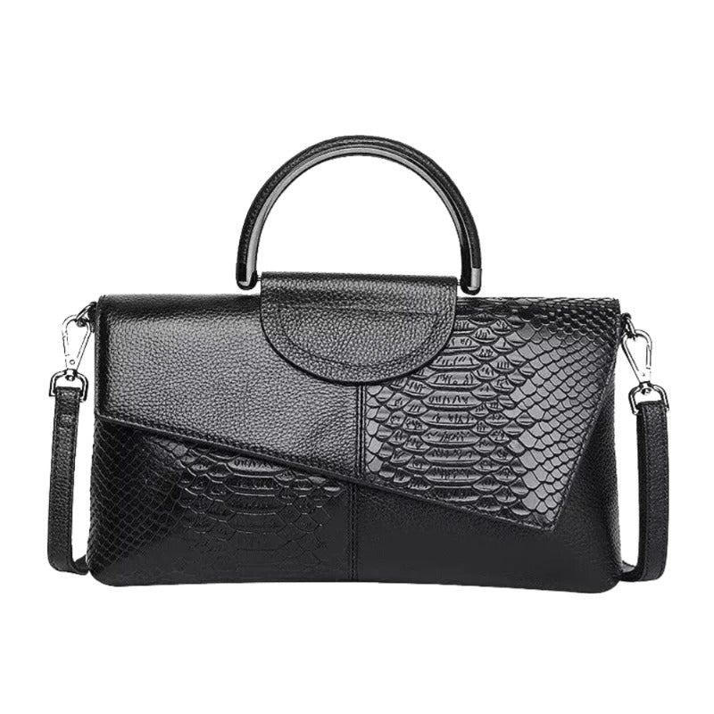 A black leather handbag with a unique snake skin texture and a curved handle.