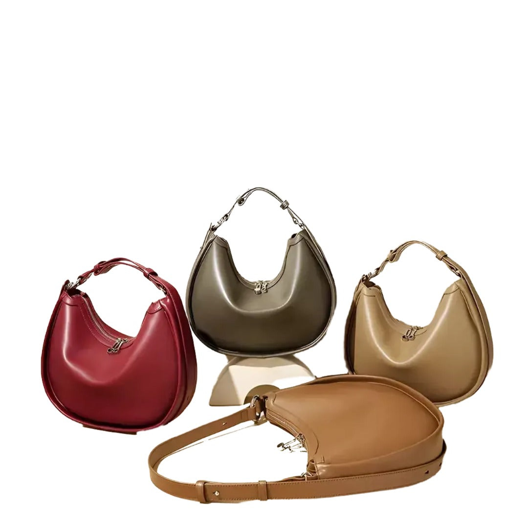 a collection of four handbags in various colors and styles, arranged on a white background.